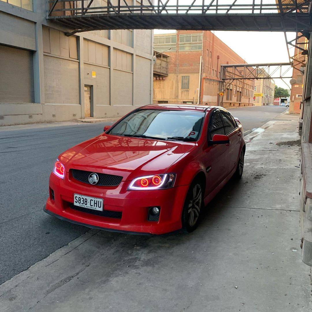 Holden VE Series 1 Black DRL Headlights Red Angel Eyes