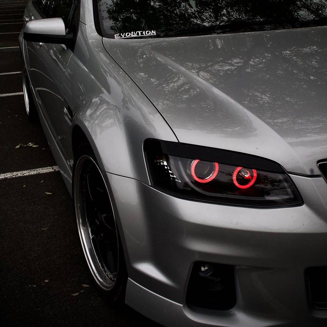 Holden VE Series 2 Black DRL Headlights Red Angel Eyes
