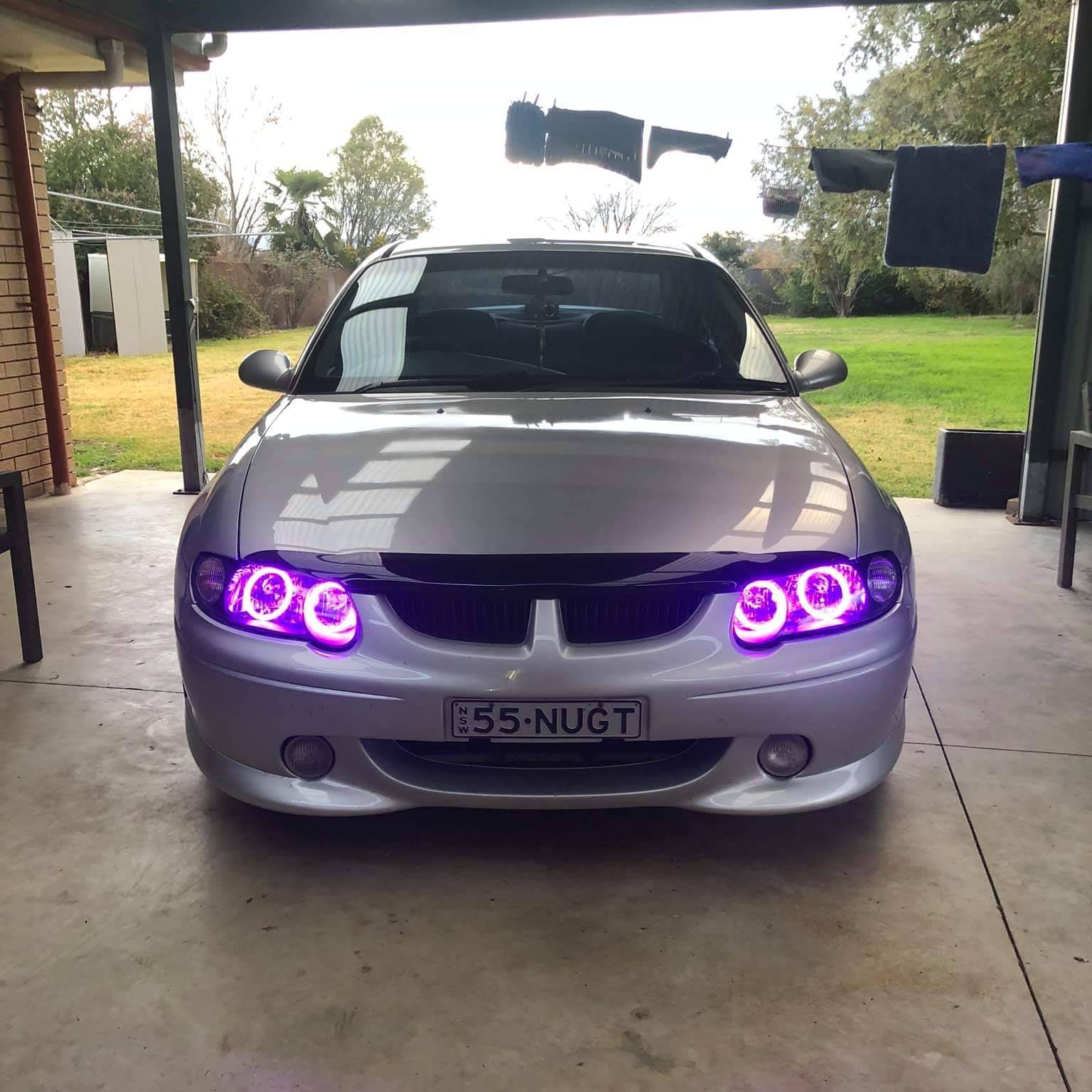 Holden VX Headlights Purple