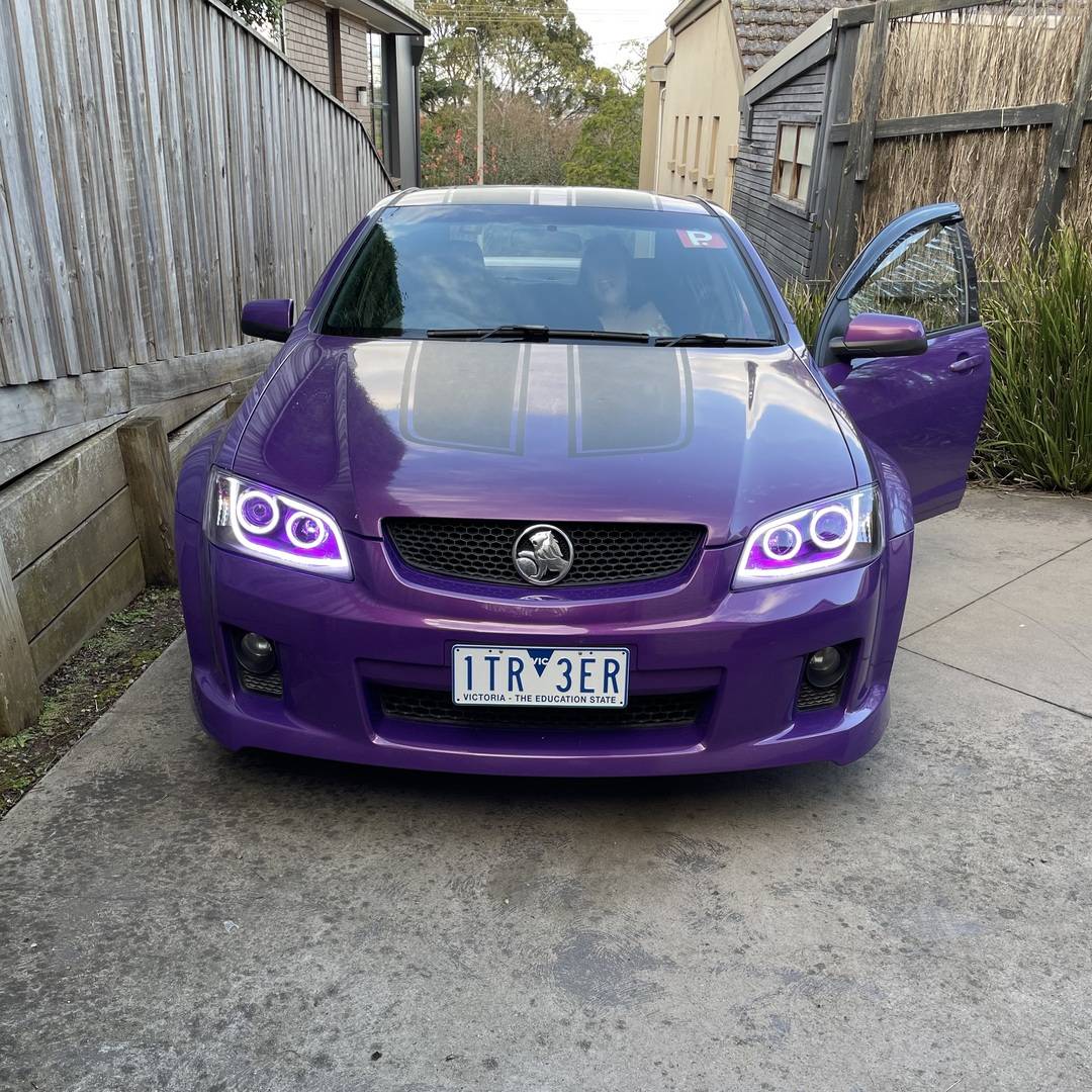 Holden VE Series 1 Black DRL Headlights with purple LED angel eye halo lights by Spectrum