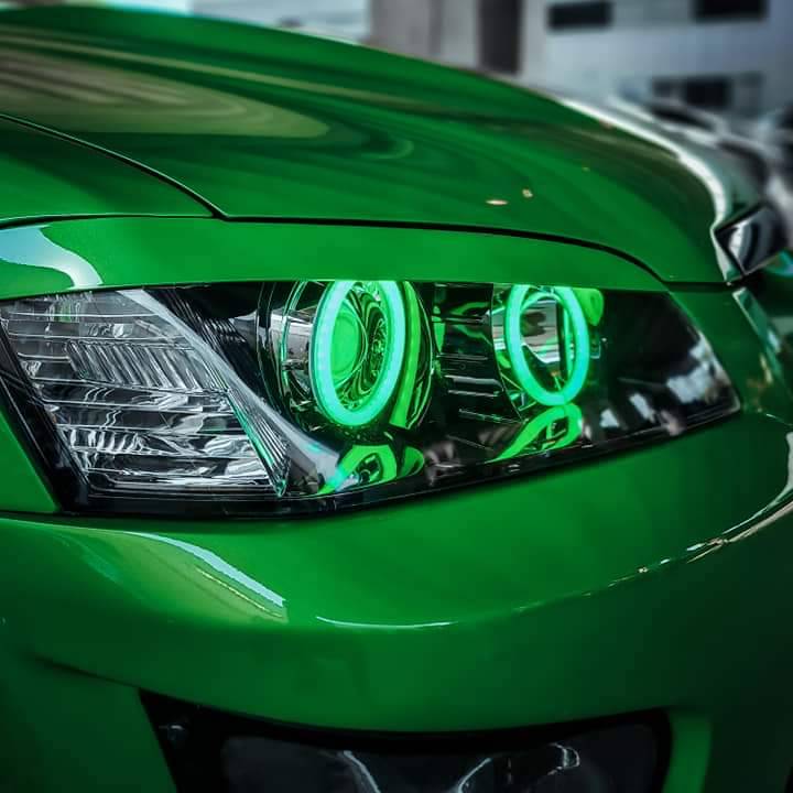 Holden VE Series 1 Headlights with green LED angel eye halo lights by Spectrum