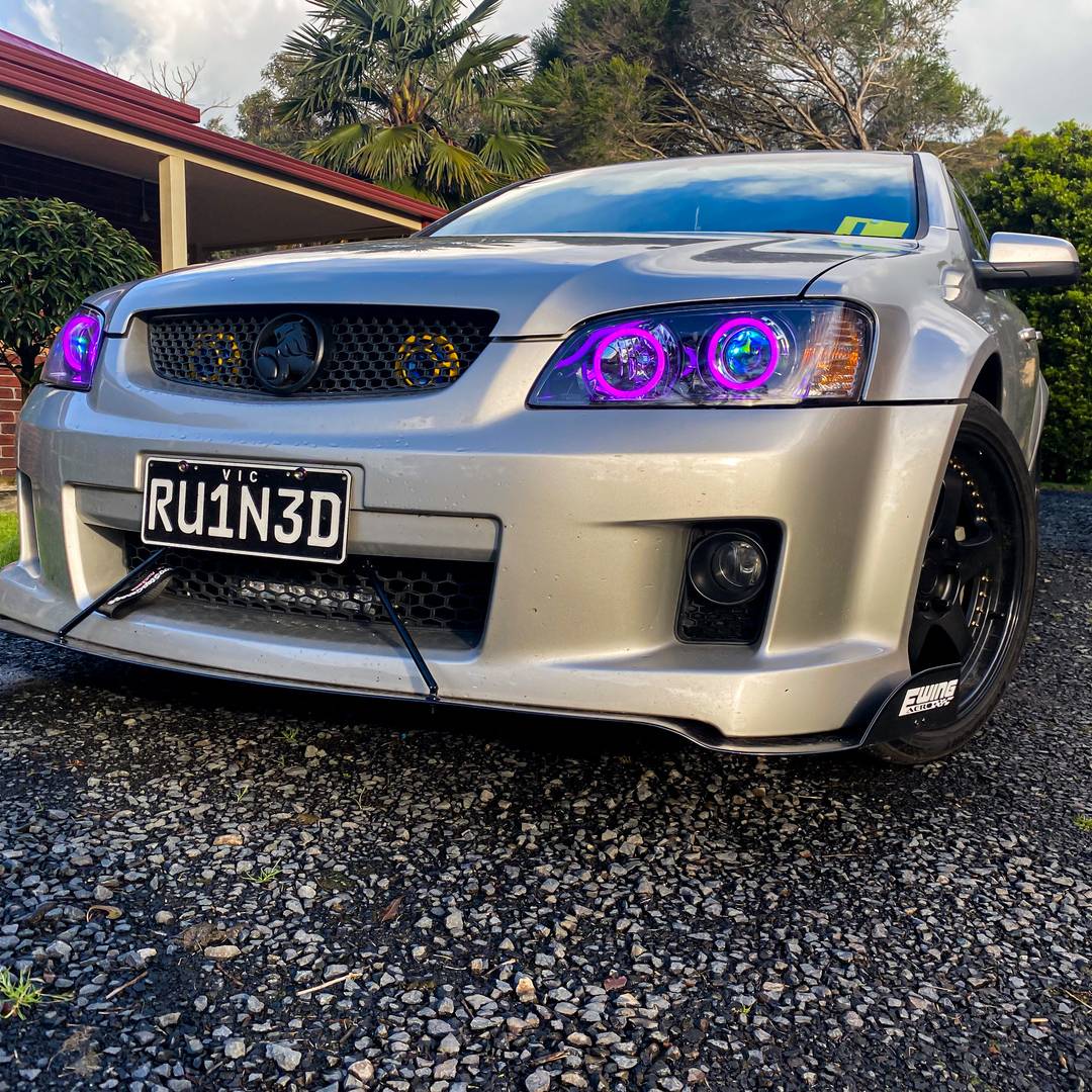 Holden VE Series 1 Headlights with pink LED angel eye halo lights by Spectrum