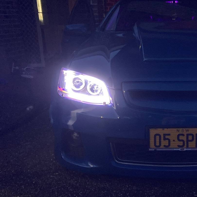 Holden VE Series 2 Black DRL Headlights with white LED angel eye halo lights by Spectrum