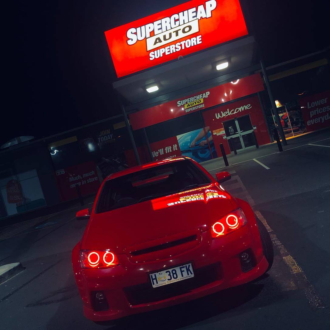 Holden VE Series 2 Headlights with red LED angel eye halo lights by Spectrum