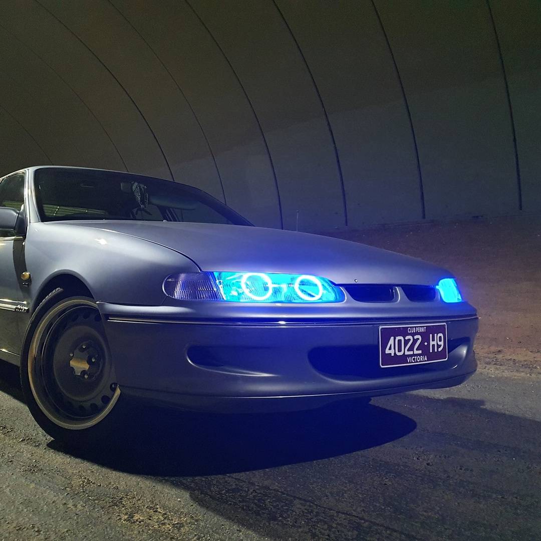 Holden VS Headlights with blue LED angel eye halo lights by Spectrum