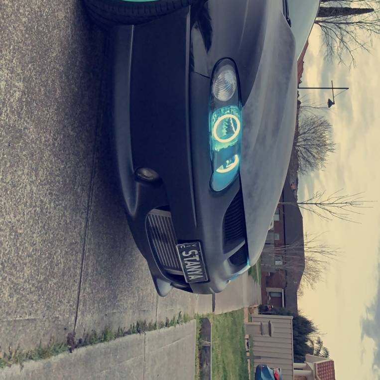 Holden VX Commodore with cyan LED angel eye headlights glowing by Spectrum