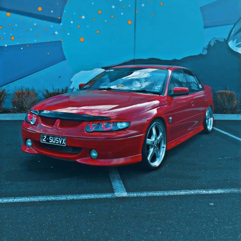 Holden VX Headlights with red LED angel eye halo lights by Spectrum