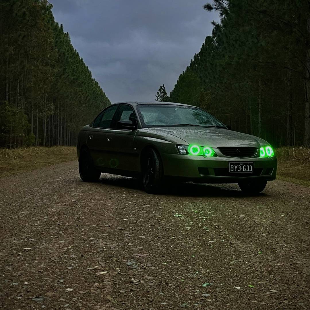 Holden VY SS Headlights with green LED angel eye halo lights by Spectrum