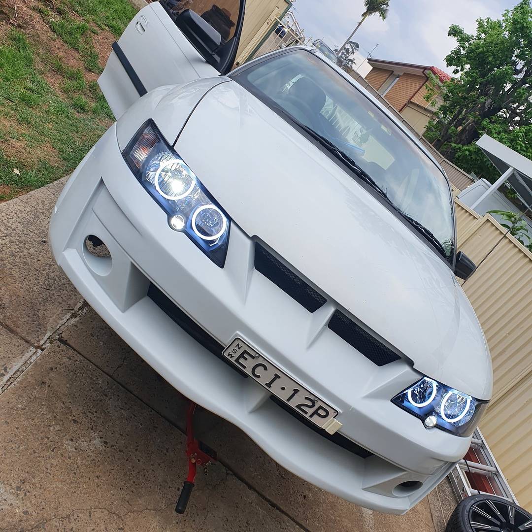Holden VY SS Headlights with white LED angel eye halo lights by Spectrum