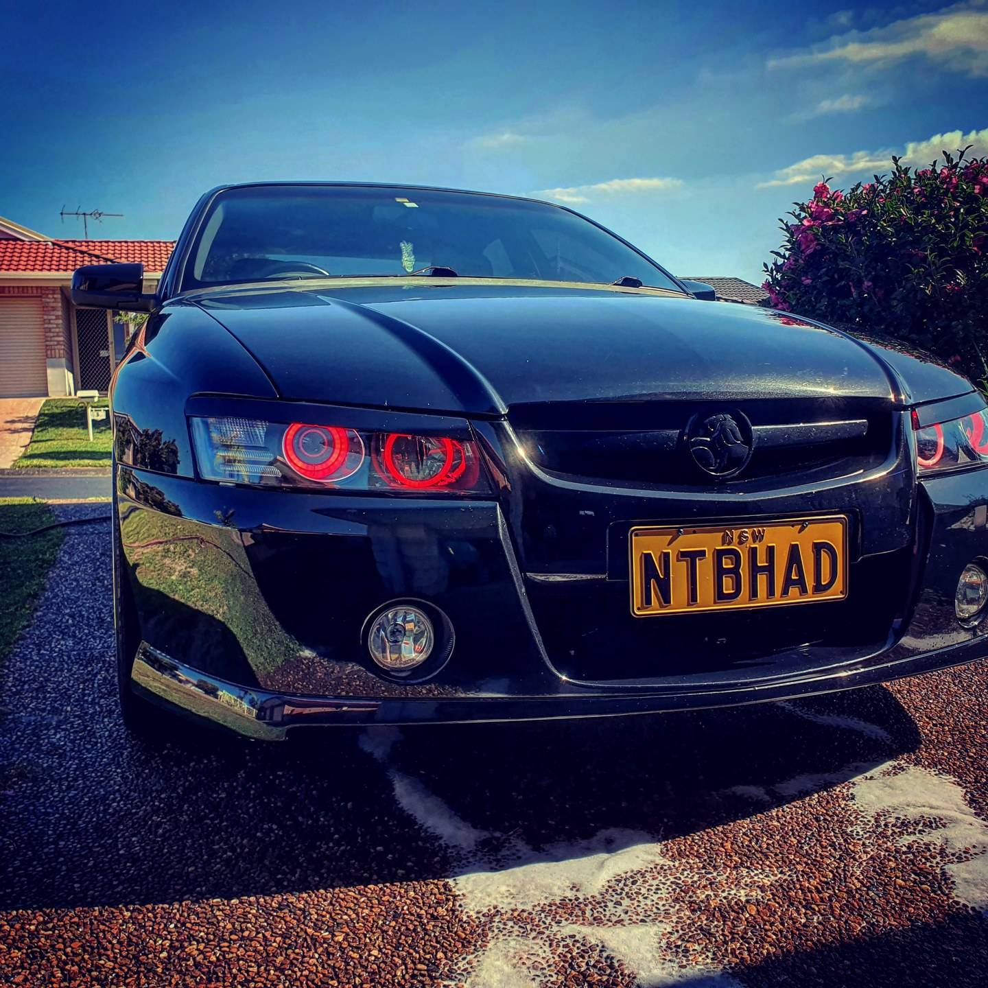 Holden VZ Headlights with red LED angel eye halo lights by Spectrum