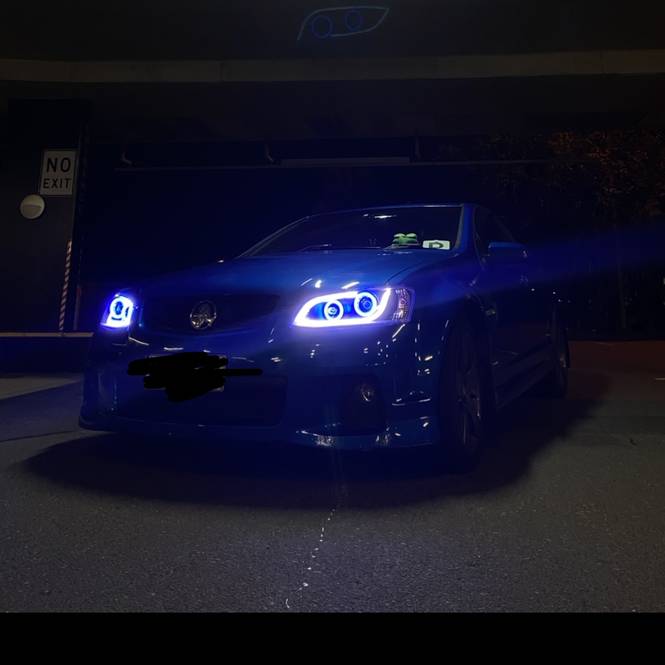 Holden VE Series 1 Black DRL Headlights with blue LED angel eye halo lights by Spectrum