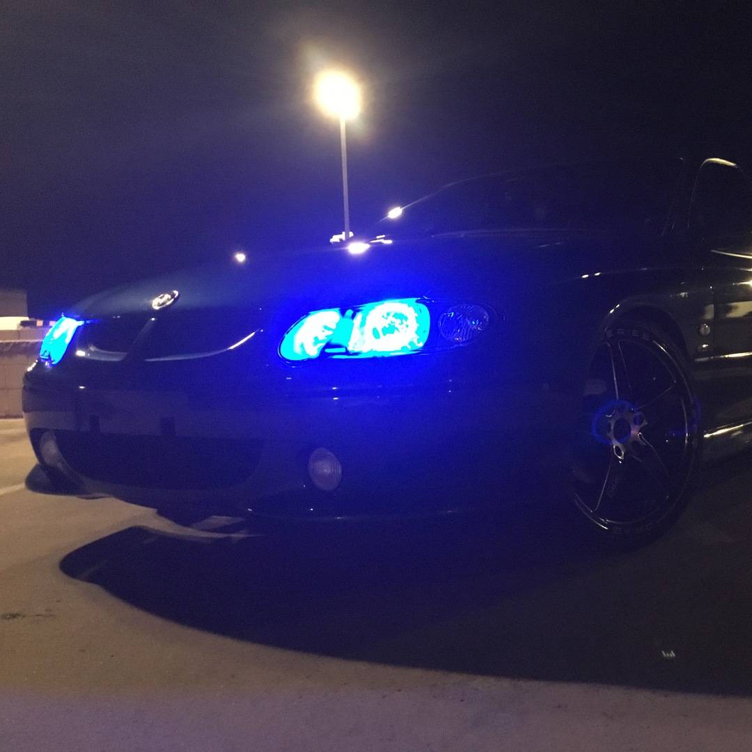 Holden VX Headlights with blue LED angel eye halo lights by Spectrum