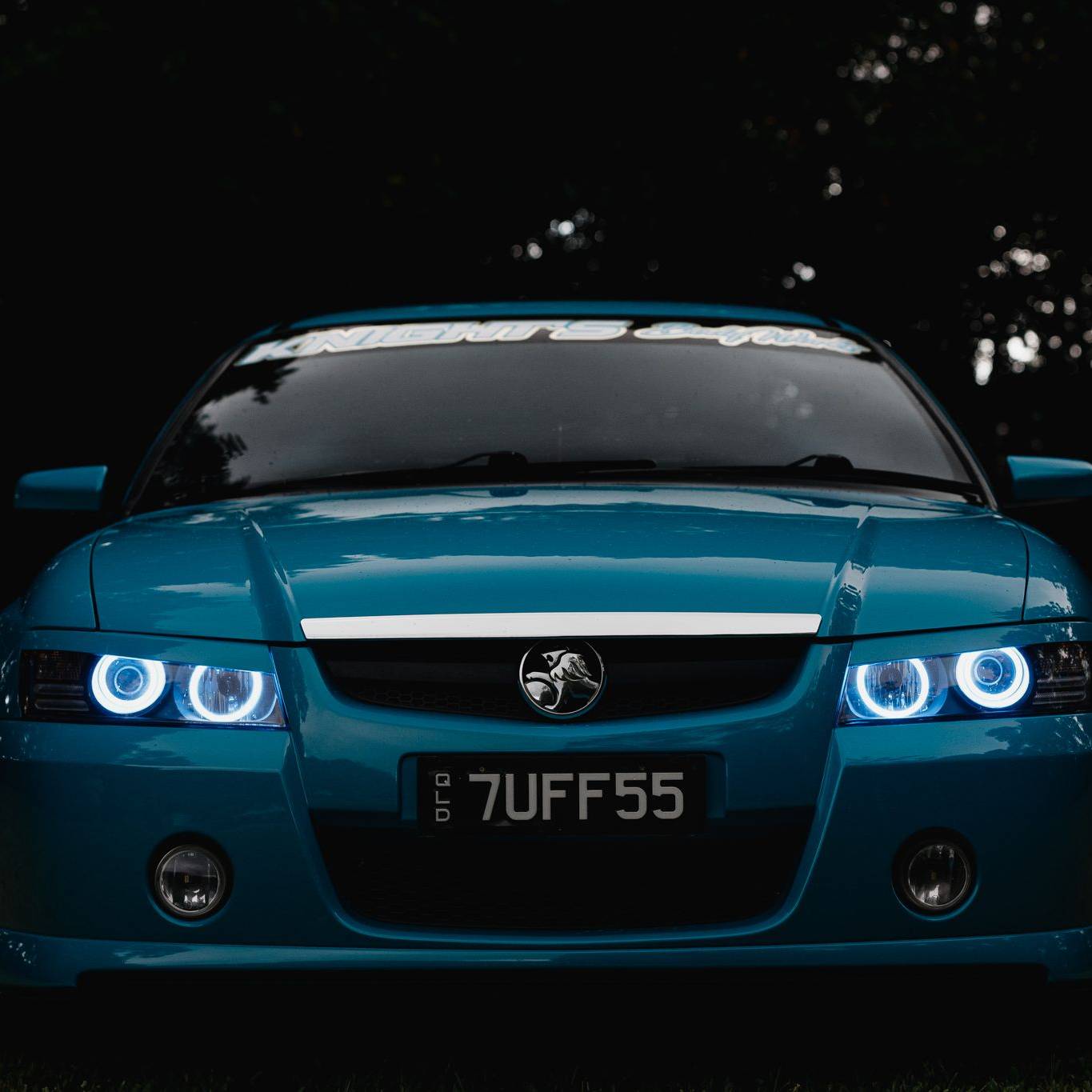 Holden VZ Headlights with white LED angel eye halo lights by Spectrum